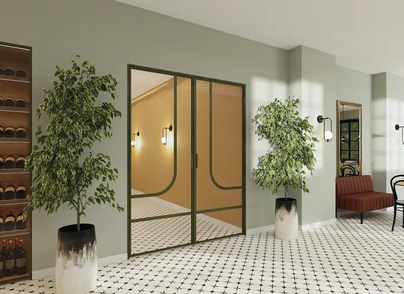 Arched aluminium doors in a green hallway