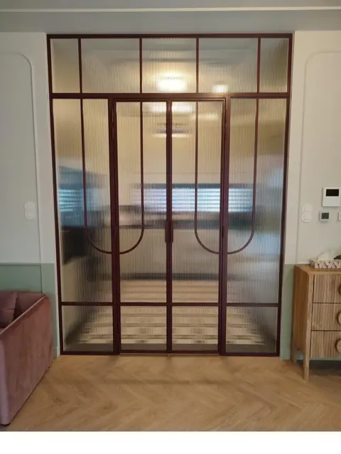 Bronze-framed glazed partition